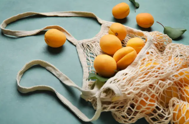 twine bag with apricots
